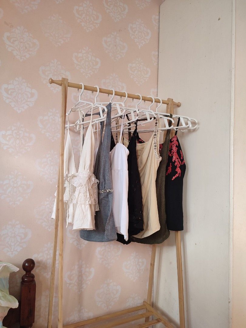 Assorted Y2K Aesthetic Cami and Halter Tops Bundle - 7 items (Category: Sleeveless) located in Jaen. Submitted by roxantiago (Listing ID 1466730565, Image 1). Description: - Wardrobe clearout: Y2K camis and halter tops - Variety of styles: Lace ruffles, beaded waistbands, cowl necks, and sequins - Neutral colors: White, grey, beige, and black - Versatile: Easy to mix and match for casual days or nights out - Purchase options: Sold individually or