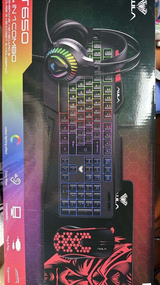 AULA T650 4 in 1 Gaming Combo Keyboard Mouse Headset Mousepad (Category: Computer Keyboard) located in Manila. Submitted by raianenokoji (Listing ID 1466619979, Image 1). Description: - Sealed and never opened - NEGOTIABLE - RFS: this is an extra - Can see the price tag on the box. - Complete 4-in-1 gaming bundle: keyboard, mouse, headset, and mousepad - Vibrant color lighting effects on the membrane keyboard - Cozy, ergonomic headset designed fo