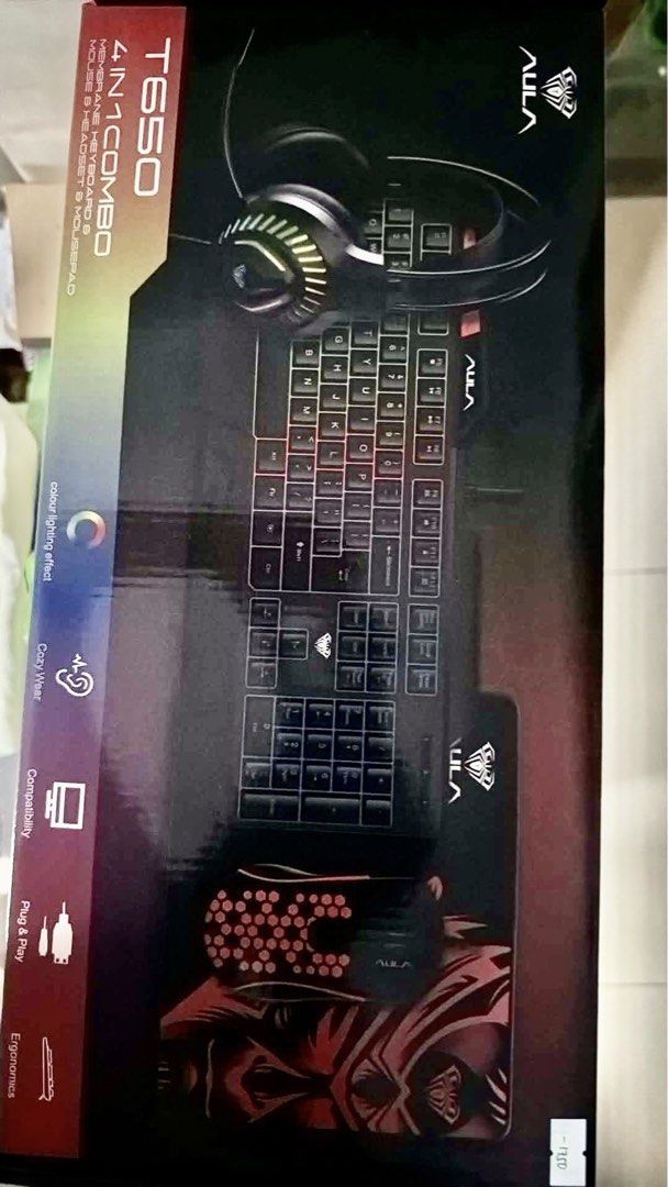 AULA T650 4 in 1 Gaming Combo Keyboard Mouse Headset Mousepad (Category: Computer Keyboard) located in Manila. Submitted by raianenokoji (Listing ID 1466619979, Image 2). Description: - Sealed and never opened - NEGOTIABLE - RFS: this is an extra - Can see the price tag on the box. - Complete 4-in-1 gaming bundle: keyboard, mouse, headset, and mousepad - Vibrant color lighting effects on the membrane keyboard - Cozy, ergonomic headset designed fo