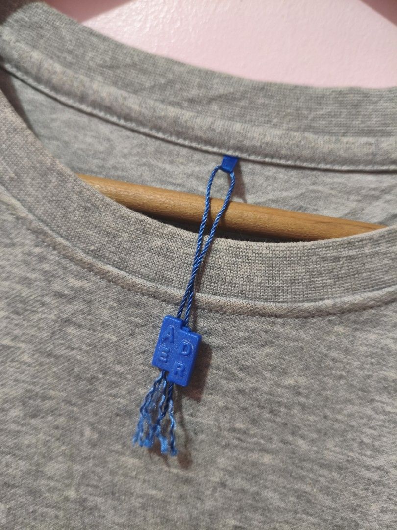 Auth. Ader Error 2022 Spring Summer Grey (Category: Tshirts & Polo Shirts ) located in Paranaque City. Submitted by glendel_04 (Listing ID 1466574311, Image 2). Description: Excellent cond. Size Large Need wash ✅.