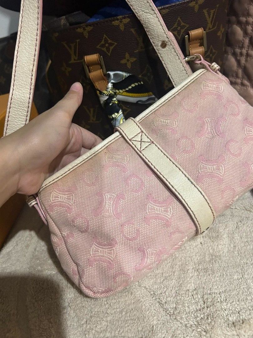 Authentic Celine Pink Macadam Shoulder Bag (Category: Luxury Bags & Wallets) located in Marikina City. Submitted by aussiemaan (Listing ID 1466627141, Image 3). Description: - Authentic pink Celine shoulder bag in classic Macadam monogram canvas - Features off-white leather trim, strap, and front buckle accent - Secure zip top closure with pink and white striped fabric lining - Interior tag includes serial number SA 00/16 and "made in China" text