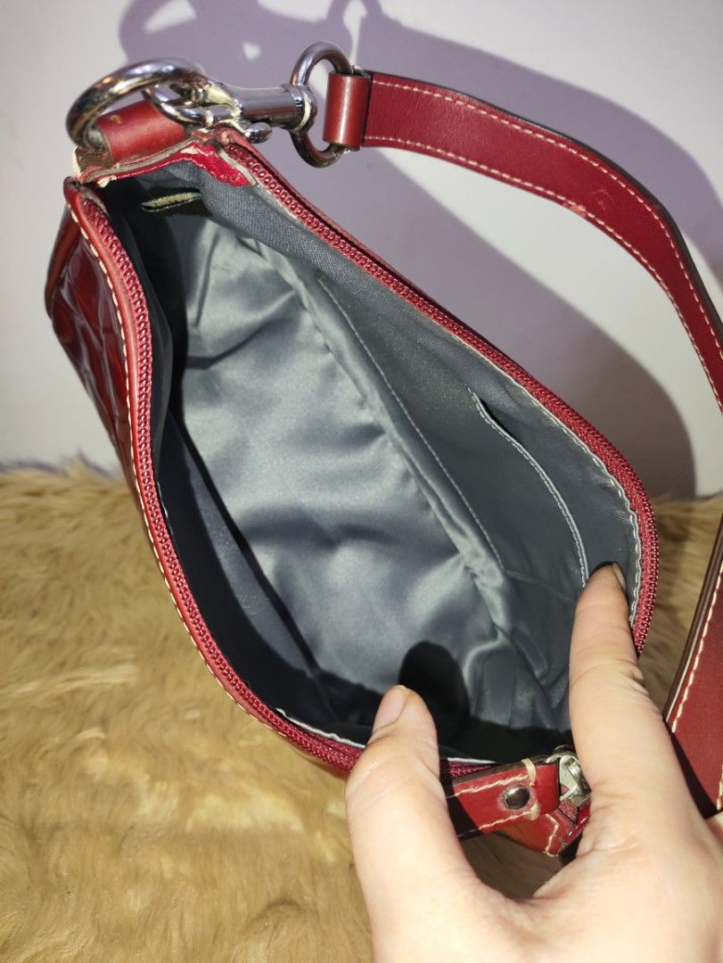 Authentic Coach demi patent kili bag (Category: Shoulder Bags) located in Rizal. Submitted by hsiri1128 (Listing ID 1466697185, Image 3). Description: 💯✔️Legit 📌From Japan Box CONDITION : 7.5/10 ISSUE / FLAWS : color transfer. check pics for details MATERIAL : Patent leather w/ silver hardwares DETAILS : fit promax and medium wallet. stand alone, spacious inside. bright red actual color.