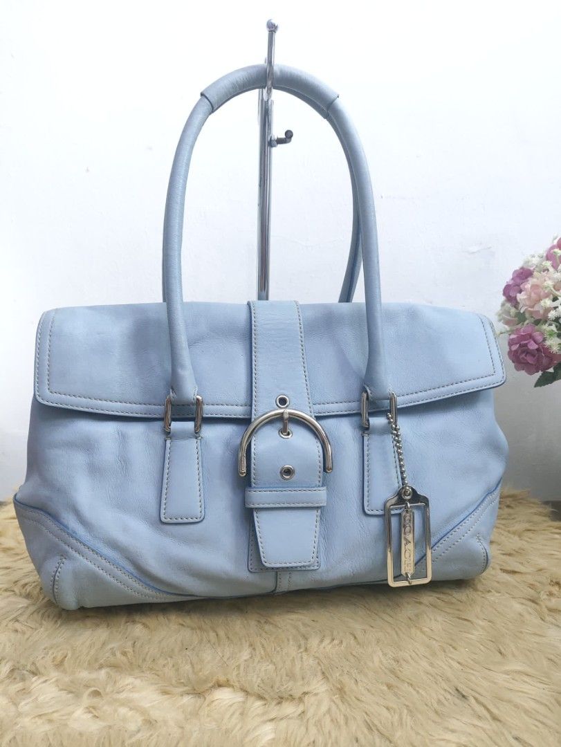 Authentic Coach Soho Flap satchel leather shoulder bag (Category: Shoulder Bags) located in Rizal. Submitted by hsiri1128 (Listing ID 1466624684, Image 1). Description: 💯✔️Legit 📌From Japan Balikbayan box 💛No major issues/flaws just normal signs of wear. ⭐intact rubberlinings. light blue actual color.