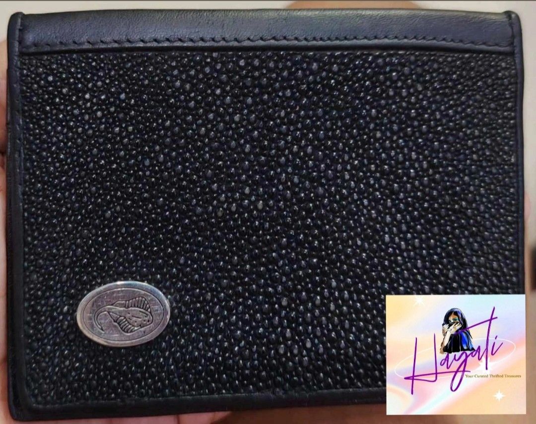 Authentic Genuine Stingray Card Wallet 🖤✨ (Category: Luxury Bags & Wallets) located in Angono. Submitted by just.call.me_lazy (Listing ID 1452315368, Image 1). Description: Authentic Genuine Stingray Card Wallet 🖤✨ A rare and durable piece crafted from genuine stingray leather — known for its glossy, beaded texture and long‑lasting quality. Perfect for collectors or anyone who values exotic craftsmanship. 📌 Features: ✔️Exotic stingray leather 
