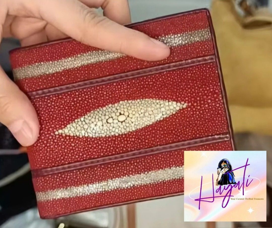Authentic Genuine Stingray Leather Bifold Wallet (Category: Luxury Bags & Wallets) located in Angono. Submitted by just.call.me_lazy (Listing ID 1466566164, Image 1). Description: ❤️✨ Genuine Stingray Leather Bifold Wallet ✨❤️ Crafted from genuine stingray leather, prized for its exceptional durability and distinctive pearl-like texture. Featuring a striking red finish with the signature stingray "eye" detail that makes every piece uniquely beaut