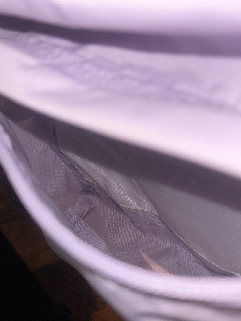Authentic Jansport Lavender Backpack (Category: Backpacks) located in Muntinlupa City. Submitted by shigglegitter27 (Listing ID 1466724685, Image 3). Description: price is negotiable!! lightly used with care :) many pockets and perfect for carrying many items.