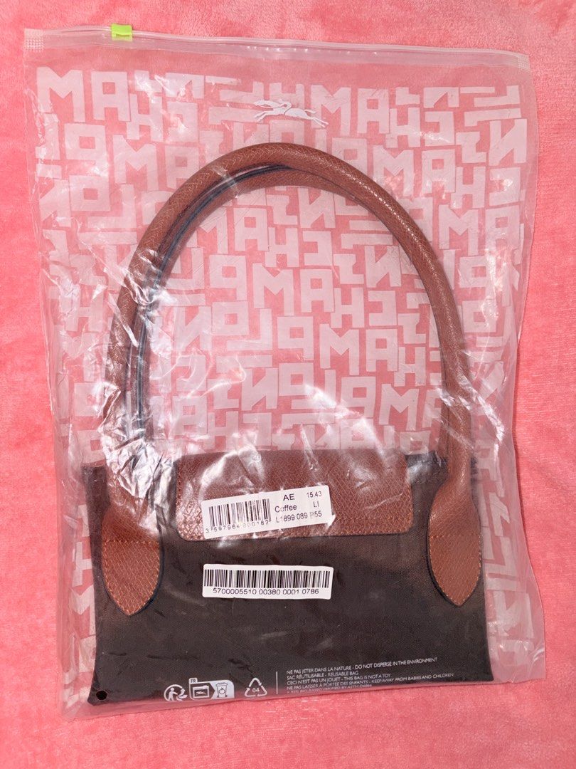 AUTHENTIC LONGCHAMP LE PLIAGE ORIGINAL L – LARGE (Category: Shoulder Bags) located in Makati City. Submitted by erica.curates (Listing ID 1466708179, Image 2). Description: AUTHENTIC LONGCHAMP LE PLIAGE ORIGINAL L – LARGE 👜 Color: Coffee/Brown Model: 1899 089 Condition: Preloved / Very Good Condition Complete with original packaging Selling Price: ₱5,500 negotiable RFS: Decluttering / not using.