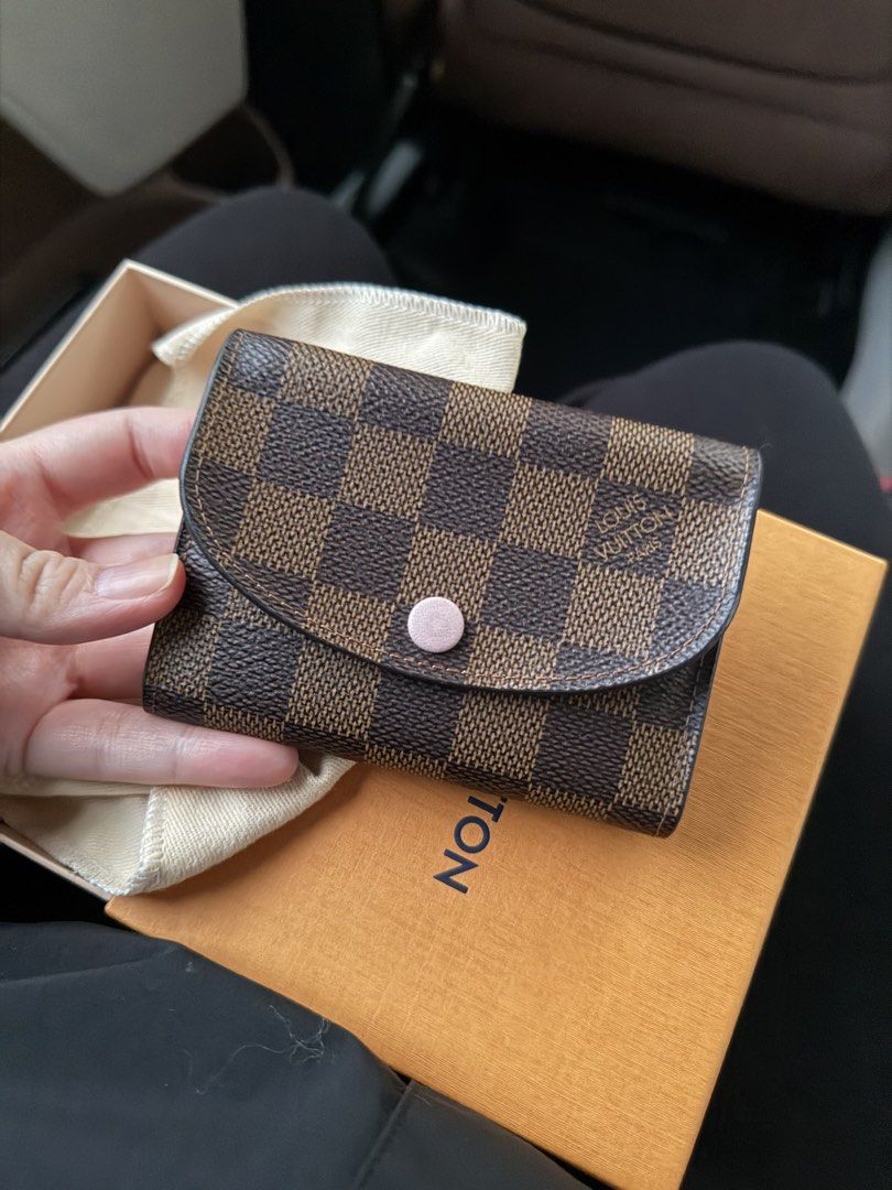 Authentic Louis Vuitton Damier Ebene Wallet (Category: Wallets & Card holders) located in Quezon City. Submitted by PrelovedTreasureees (Listing ID 1466648110, Image 1). Description: - Great condition. Only issue is the flap is kind of folding out, probably from being opened repeatedly - Pink interior - Card holder but I use it as a normal wallet and just fold my cash - Has a zip pocket that can be used for some coins .