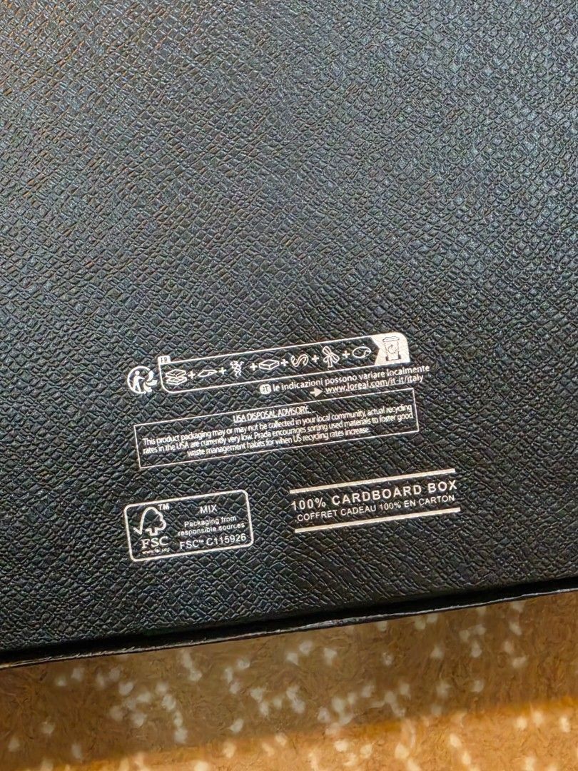 Authentic Prada Black Gift Box Saffiano Texture (Category: Luxury Bags & Wallets) located in Makati City. Submitted by berean87 (Listing ID 1466732067, Image 2). Description: - Authentic Prada textured cardboard box - Classic black exterior with white logo lettering - Dimensions: approx. 24 cm x 18 cm - Includes clean black shredded paper packaging - Excellent, clean condition - perfect for gifting or luxury storage.