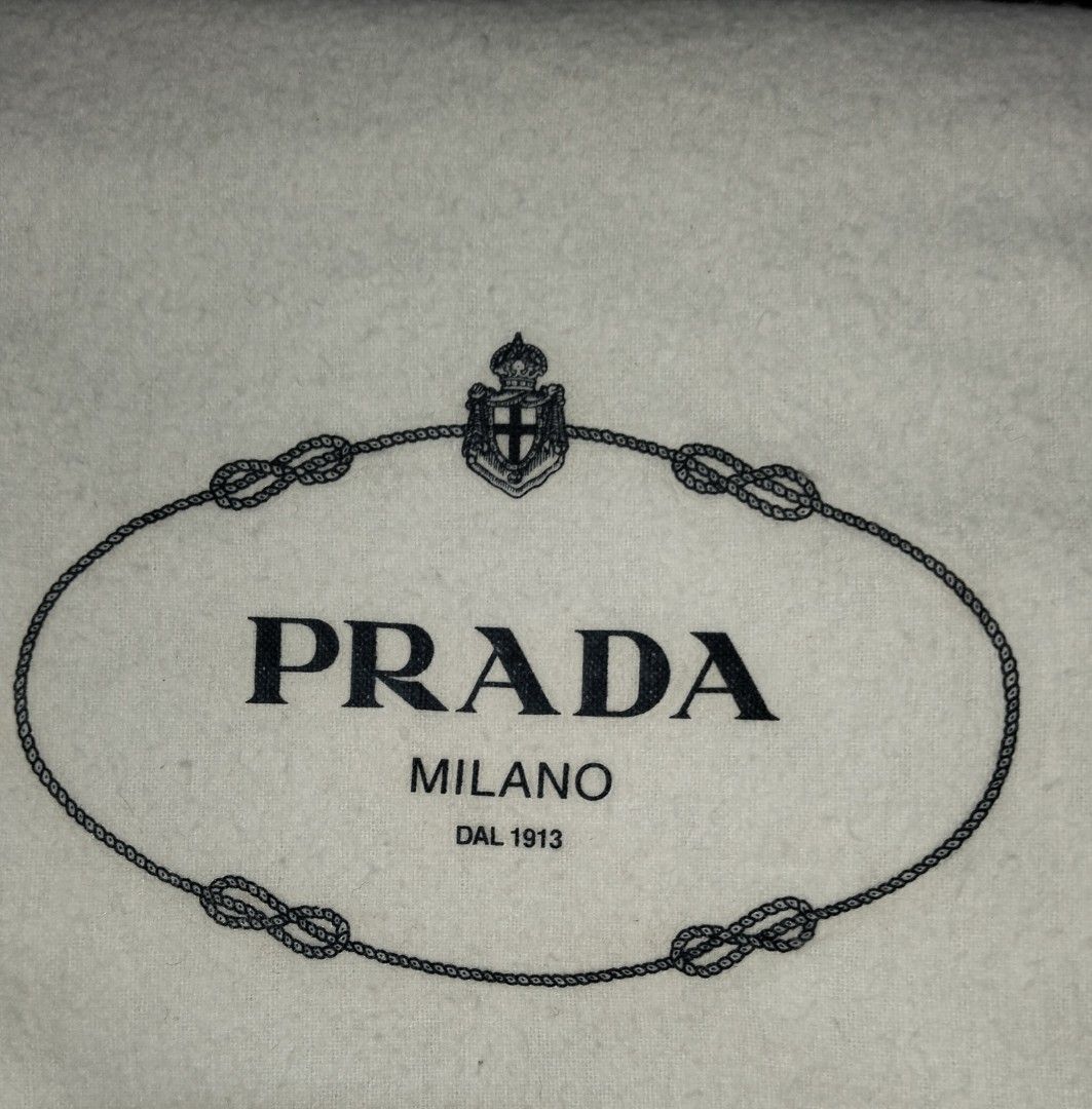 Authentic PRADA dust bag dustbag (Category: Luxury Accessories) located in Zamboanga. Submitted by luxuryaccessories_ella.2022 (Listing ID 1466683698, Image 2). Description: Authentic 👉 Lightly used 👉sized by cm ( centimeters) 👉 already wash 👉add sf 👉Loc po is Mindanao 👉 shipping thru J &T add 89 sa sf 👉MOP:Gcash or BPI.