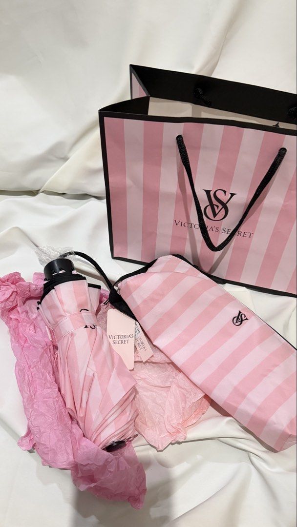 Authentic Victoria's Secret umbrella (Category: Umbrellas) located in San Fernando. Submitted by luxchic_pampanga (Listing ID 1466773164, Image 1). Description: brandnew purchased in moa (P2,290) w tag price and paperbag .