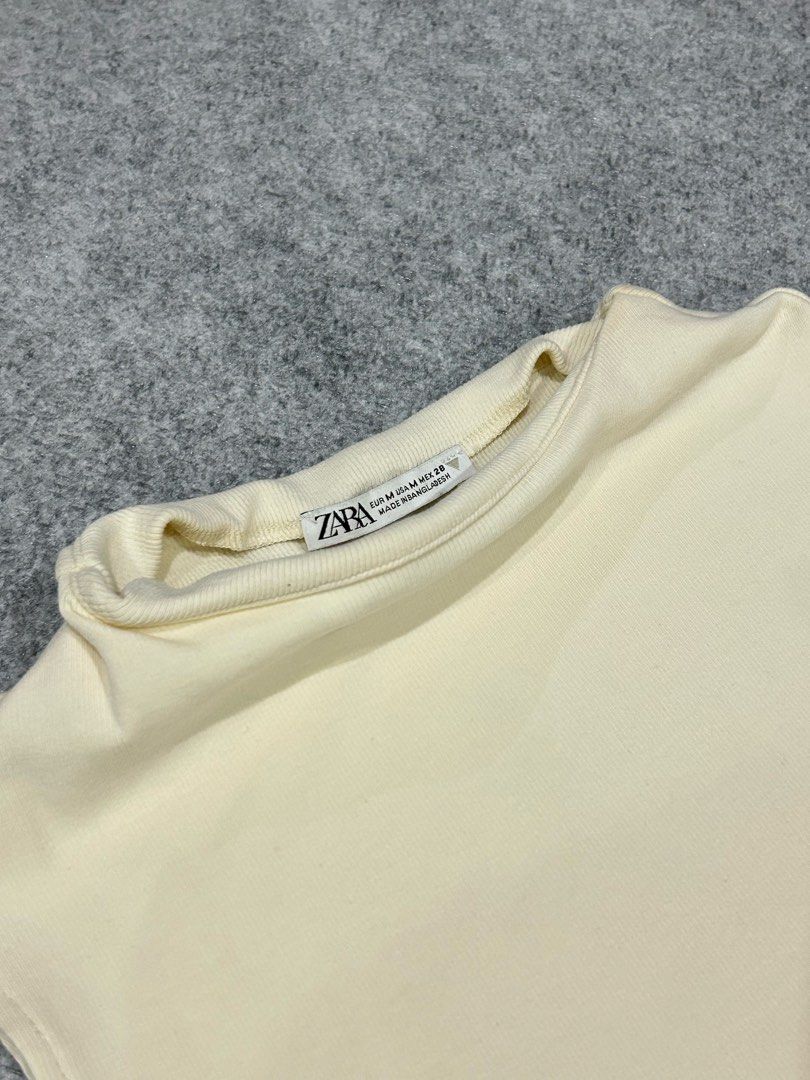 Authentic Zara Cream Ribbed Top (Category: Sleeveless) located in Balanga. Submitted by shenanigansph (Listing ID 1466570979, Image 2). Description: *authentic size: small to medium condition: 10/10 flaws: n/a rfs: decluttering 𝘊𝘖𝘓𝘖𝘙 𝘔𝘈𝘠 𝘝𝘈𝘙𝘠 𝘚𝘓𝘐𝘎𝘏𝘛𝘓𝘠 𝘋𝘜𝘌 𝘛𝘖 𝘓𝘐𝘎𝘏𝘛𝘐𝘕𝘎 🪩.