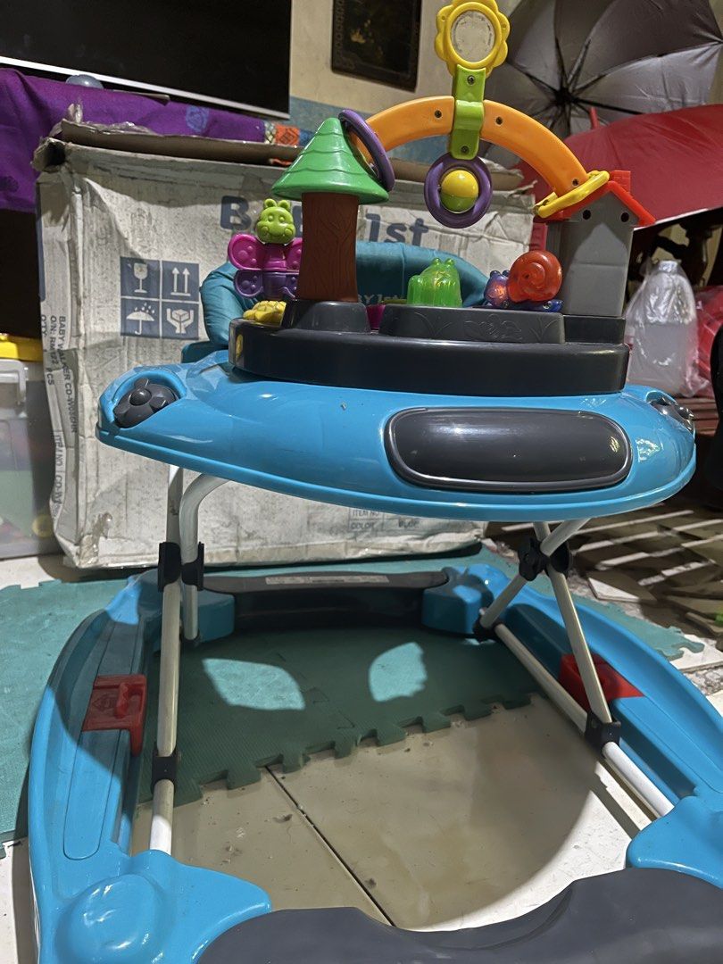 Baby Walker (Category: Infant Playtime) located in Santa Rosa. Submitted by jjj_aaa (Listing ID 1466636653, Image 3). Description: 2-in-1 Convertible Base: The lower side panels can flip or switch positions to change the unit from a rolling walker to a curved, stationary rocker base..