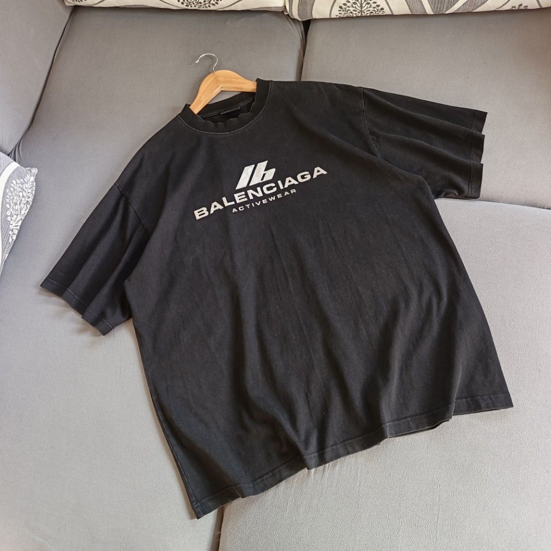 Balenciaga Activewear Reflective Logo Tee (Category: Luxury Apparel) located in Banaue. Submitted by radical.thrift (Listing ID 1466687603, Image 1). Description: Balenciaga Activewear Reflective Logo Tee medium on tag, oversized fits xl (24.5W 29.5L) 9/10 condition & color rate issue: minor signs of usage on reflective logo ₱650+sf.