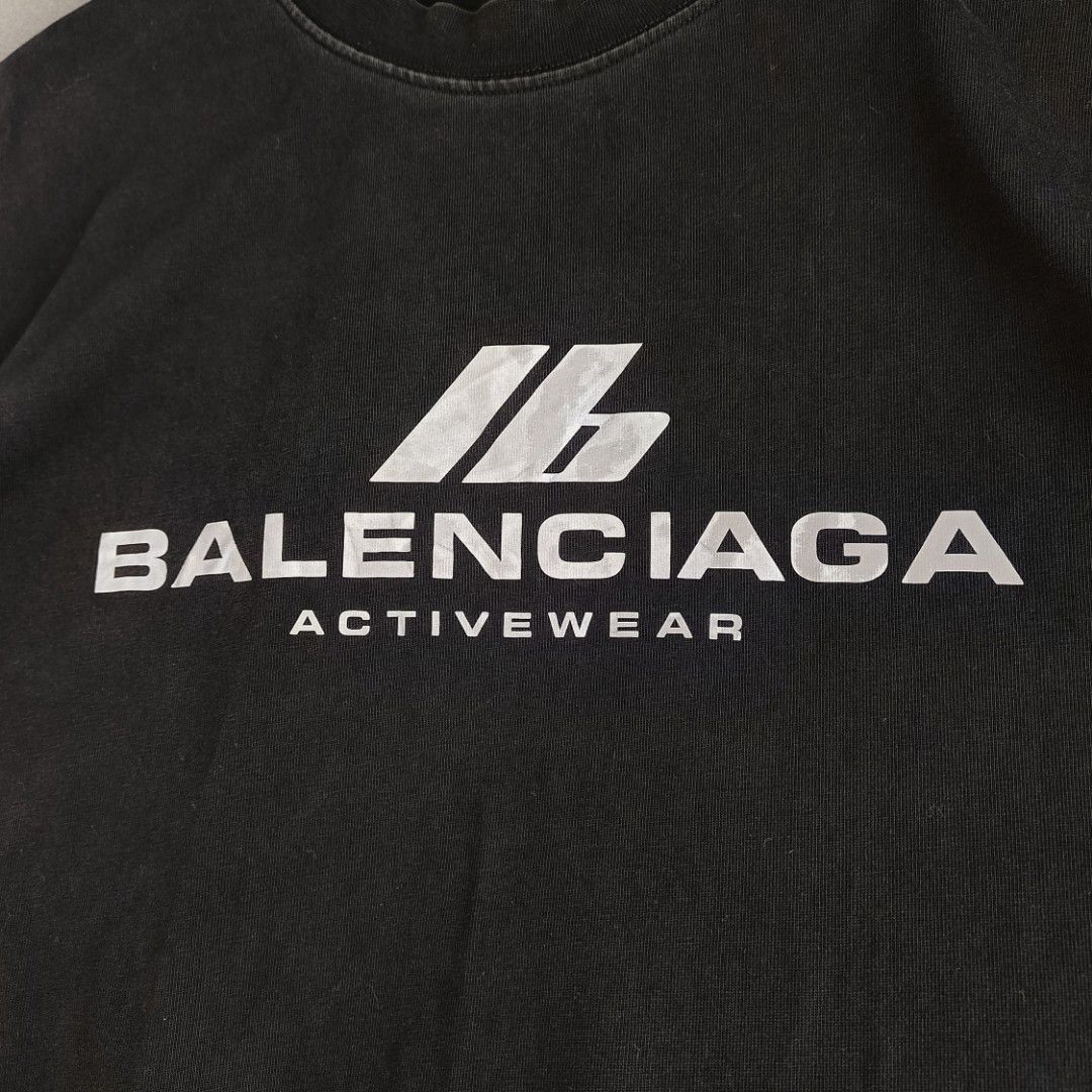 Balenciaga Activewear Reflective Logo Tee (Category: Luxury Apparel) located in Banaue. Submitted by radical.thrift (Listing ID 1466687603, Image 2). Description: Balenciaga Activewear Reflective Logo Tee medium on tag, oversized fits xl (24.5W 29.5L) 9/10 condition & color rate issue: minor signs of usage on reflective logo ₱650+sf.