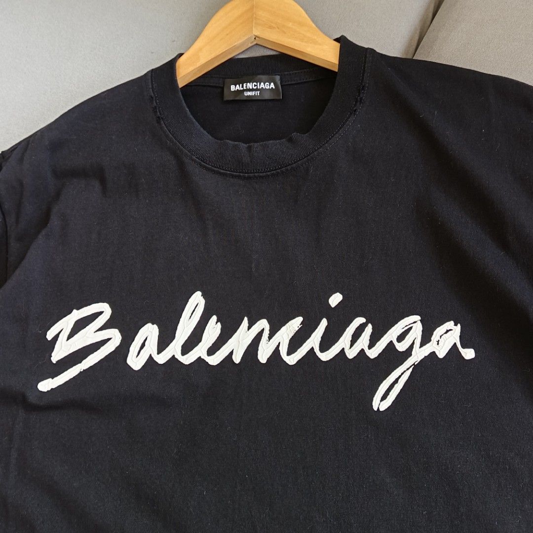 Balenciaga Script Logo Distressed Tee (Category: Luxury Apparel) located in Banaue. Submitted by radical.thrift (Listing ID 1466688008, Image 2). Description: Balenciaga Script Logo Distressed Tee small on tag, oversized fits large (21.5W 28L) good as new condition ₱1K+sf.