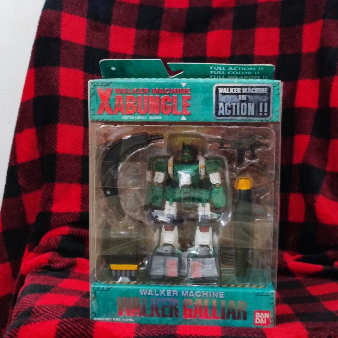 Bandai 2001 Walker Machine Galliar Action Figure (Category: Figurines & Statues) located in Aliaga. Submitted by nekotoys (Listing ID 1466618712, Image 1). Description: - Authentic Bandai 2001 Xabungle Walker Machine Galliar action figure - Brand new and unopened in original packaging with clear window - Transforms into Galley Hover and Galley Wheel modes - Includes rifle, boomerang idiom, missile launcher, and giant bazooka - Comes with intercha