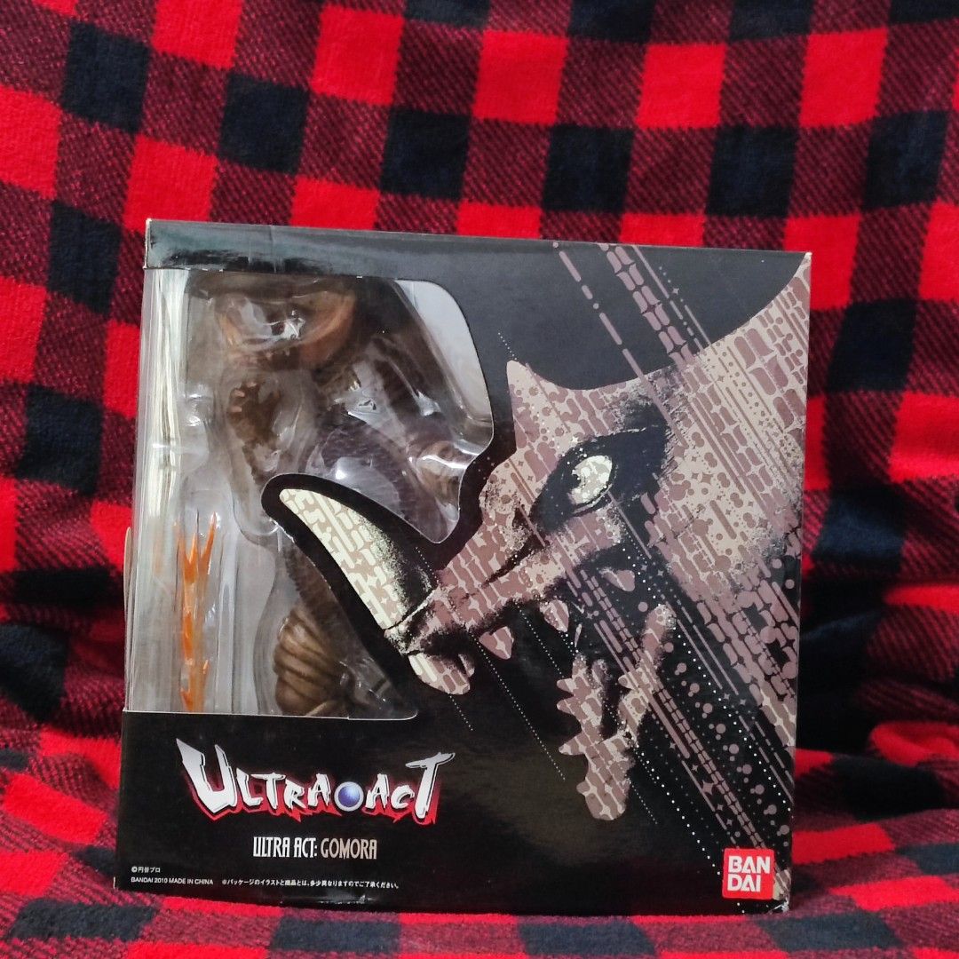 Bandai Ultra-Act Gomora Action Figure (Category: Figurines & Statues) located in Aliaga. Submitted by nekotoys (Listing ID 1466620965, Image 2). Description: - Official Bandai Ultra-Act Gomora figure (2010 release, made in China) - Highly articulated monster toy with authentic sculpting and paint work - Comes with monster parts and special effect pieces - Includes original box and plastic window packaging - A must-have for tokusatsu and kaiju col