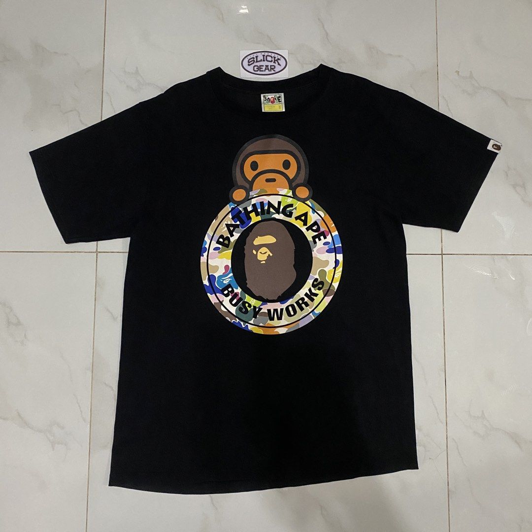 BAPE Milo Busy Works Multi Camo Tee (Category: Tshirts & Polo Shirts ) located in Quezon City. Submitted by slickgearph (Listing ID 1466770109, Image 1). Description: BAPE Milo Busy Works Multi Camo Tee Size M Conditon 9/10 ₱2,000 IG: slickgearph.