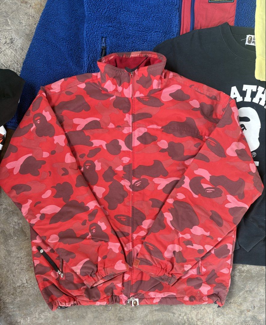 Bape Red Camou Windbreaker (Category: Coats, Jackets and Outerwear) located in Manila. Submitted by bravestone14 (Listing ID 1466626466, Image 1). Description: Bape Red Camou Windbreaker Fits to large no issue excellent condition 6k+sf HMU! Thankyou and appreciate✨.