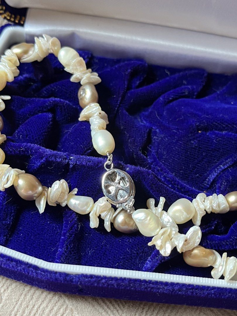 Freshwater Pearl Necklace with Clasp (Category: Necklaces) located in Tandag. Submitted by maryarlale42144 (Listing ID 1466568087, Image 3). Description: - Type: Multicolor baroque freshwater pearl necklace - Colors: Mix of white, cream, and bronze tones - Shapes: Unique irregular nugget and potato shapes - Clasp: Detailed silver-tone metal clasp for secure wear - Condition: Brand new and carefully stored.