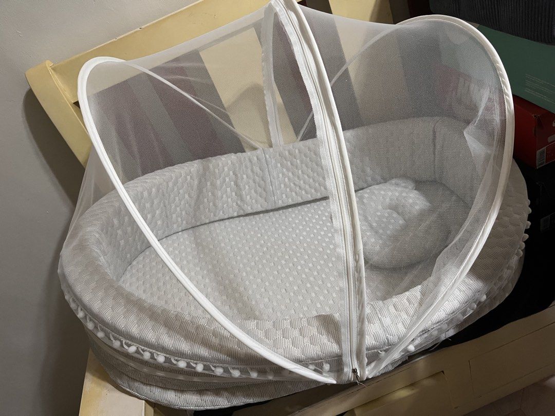 Basinet with mosquito net for sale (Category: Children's Beds) located in Manila. Submitted by danielatuyor (Listing ID 1466601414, Image 2). Description: BASINET WITH MOSQUITO NET FOR SALE Like new!! Ilang beses lang nagamit kasi ayaw nya matulog dito. Nanjan na din yung price nung binili ko. .