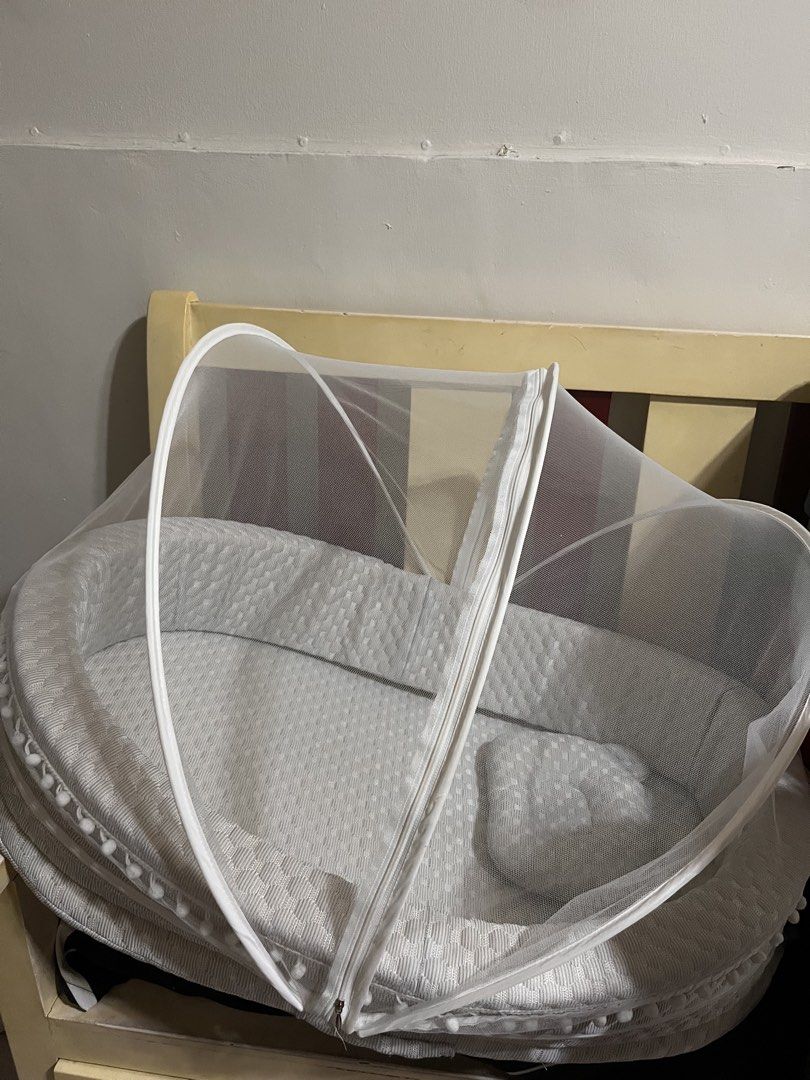 Basinet with mosquito net for sale (Category: Children's Beds) located in Manila. Submitted by danielatuyor (Listing ID 1466601414, Image 3). Description: BASINET WITH MOSQUITO NET FOR SALE Like new!! Ilang beses lang nagamit kasi ayaw nya matulog dito. Nanjan na din yung price nung binili ko. .