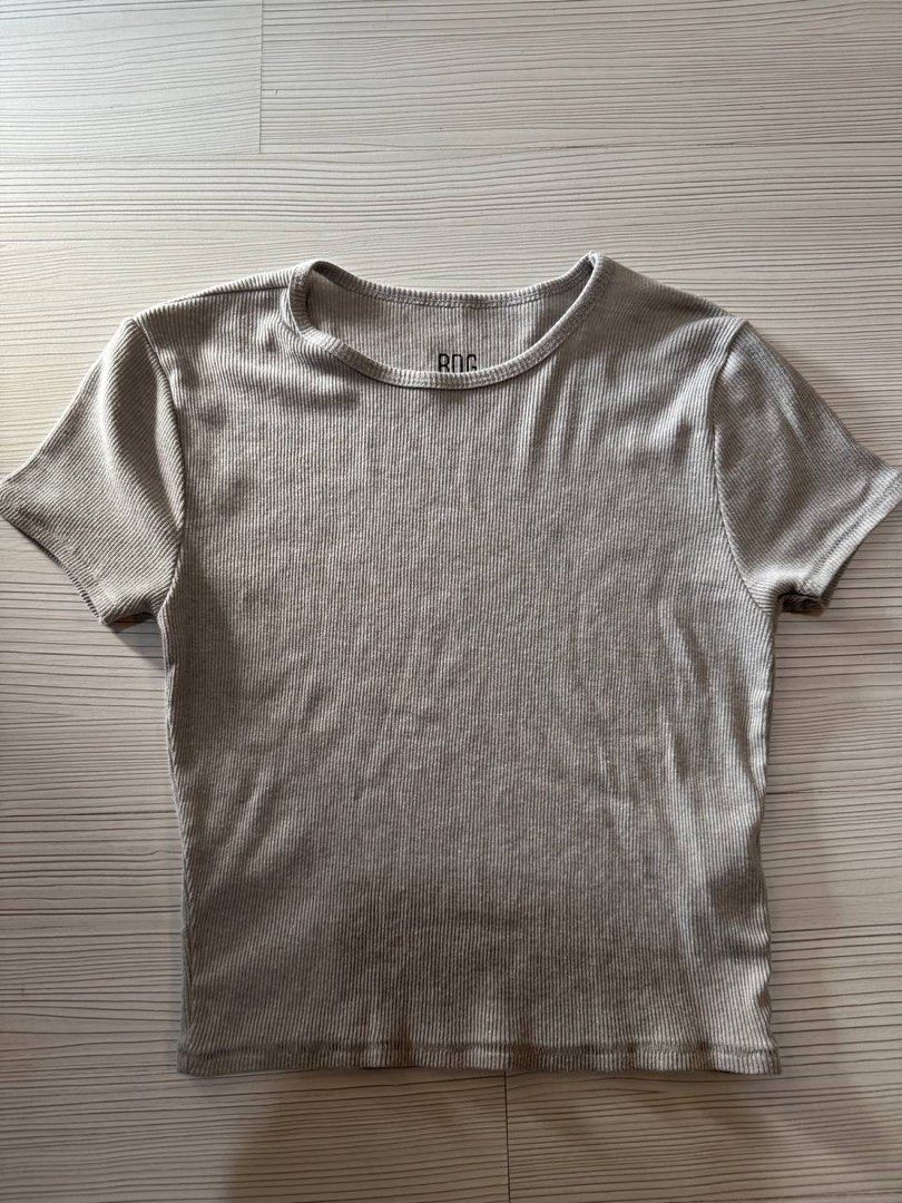 BDG Ribbed Crop Top Grey Size M (Category: Shirts) located in Taguig. Submitted by anxmz (Listing ID 1466674664, Image 1). Description: - Used once - Brand: BDG - Color: Grey - Size: Medium (true to size) - Material: Super soft stretch fabric - Details: Ribbed texture, short sleeves, round neckline - Origin: Made in Guatemala - Style: Casual everyday basic, perfect with jeans or high-waisted shorts.