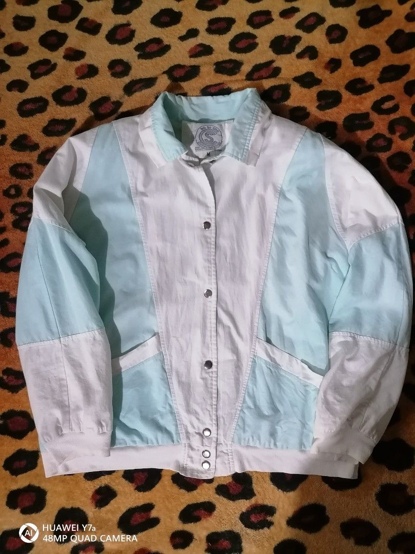 Be in the Current Seen vintage color block jacket (Category: Coats, Jackets and Outerwear) located in Naga. Submitted by mrwisethrifter (Listing ID 1466574117, Image 2). Description: - Brand/Style: Vintage Be in the Current Seen color block jacket - Color: White and pastel blue panels - Size: Medium - Material: 100% cotton shell, nylon sleeve and body lining - Features: Front snap buttons and functional pockets - Origin: Made in Egypt - Care: Mac
