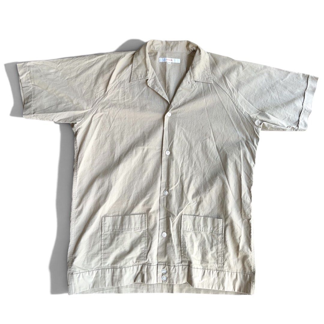 Beams Open Collar Camp Utility Shirt Beige (Category: Formal Shirts) located in Binan City. Submitted by ronsanchez (Listing ID 1466576897, Image 1). Description: Beams Open Collar Camp Utility Shirt Beige Very minimal sign of wear. Excellent Condition. Open camp collar (Cuban collar) that features a relaxed, flat-laying neckline. Two large, lower utility patch pockets positioned near the bottom hem, both secured with button-down flaps Lightweigh