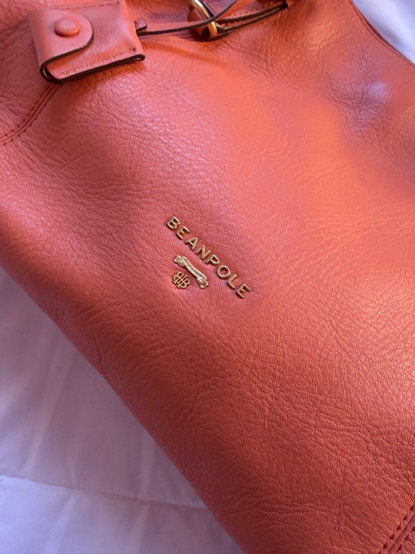 BEANPOLE LEATHER TOTE 2-WAY BAG (Category: Tote Bags) located in Santiago. Submitted by findsbyjew (Listing ID 1466571110, Image 3). Description: BEANPOLE LEATHER CORAL ORANGE TOTE 2-WAY BAG 🍊🧡 — south korea brand, 10/10 condi need lang onting cleaning • no return nor exchange • mine now, pay now • ship via jnt nationwide Loc: Santiago City Isabela.