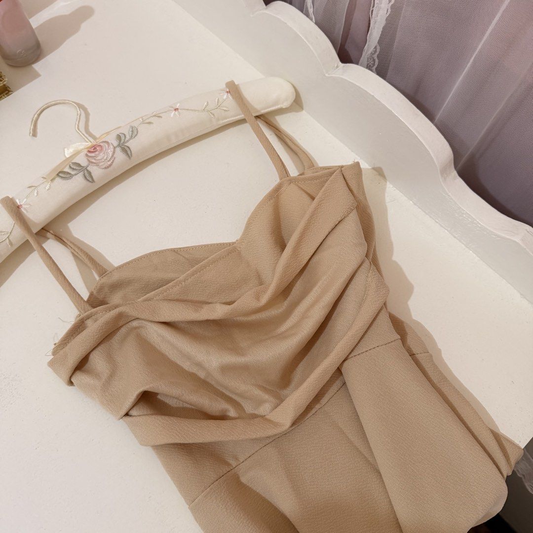 Beige Spaghetti Strap Draped Midi Dress (Category: Dresses) located in Cebu City. Submitted by softly.preloved (Listing ID 1466772256, Image 2). Description: -nude/elegant beige -spaghetti strap midi dress with cowl neckline and flared skirt - very flattering - worn once for a few hours, super clean, and ready to wear - Perfect for: Date nights, parties, or casual events.