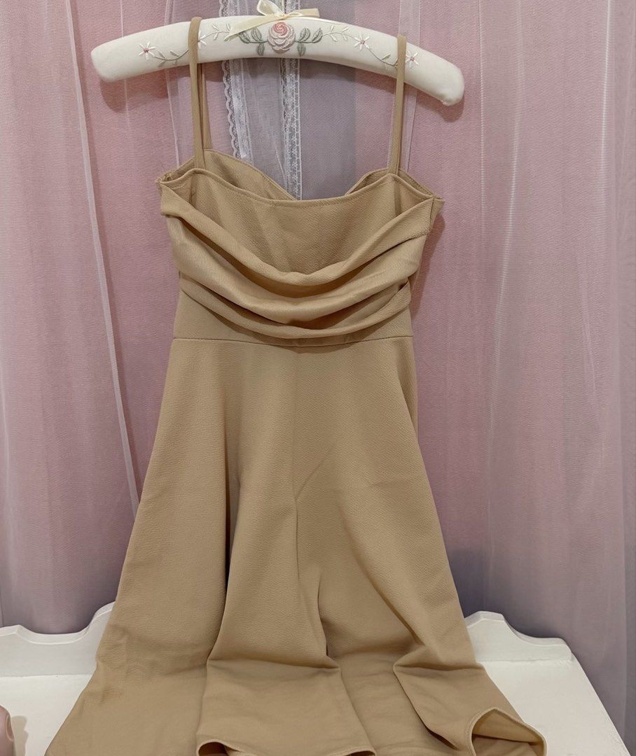Beige Spaghetti Strap Draped Midi Dress (Category: Dresses) located in Cebu City. Submitted by softly.preloved (Listing ID 1466772256, Image 3). Description: -nude/elegant beige -spaghetti strap midi dress with cowl neckline and flared skirt - very flattering - worn once for a few hours, super clean, and ready to wear - Perfect for: Date nights, parties, or casual events.