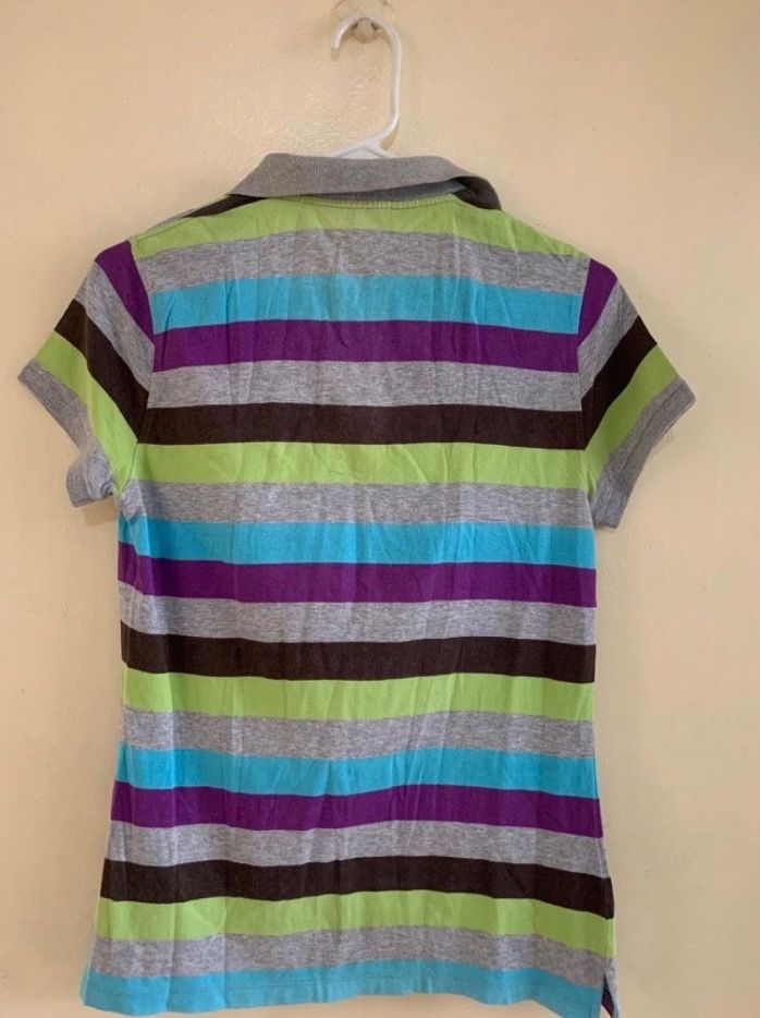 Beverly Hills Poloshirt Womens (Category: Blouses) located in Valenzuela. Submitted by clickandshoppreloved (Listing ID 1466623316, Image 2). Description: Beverly Hills Poloshirt Womens Onhand, Original Small Ontag, (24L x 16W) Color : Striped (Good Condition).