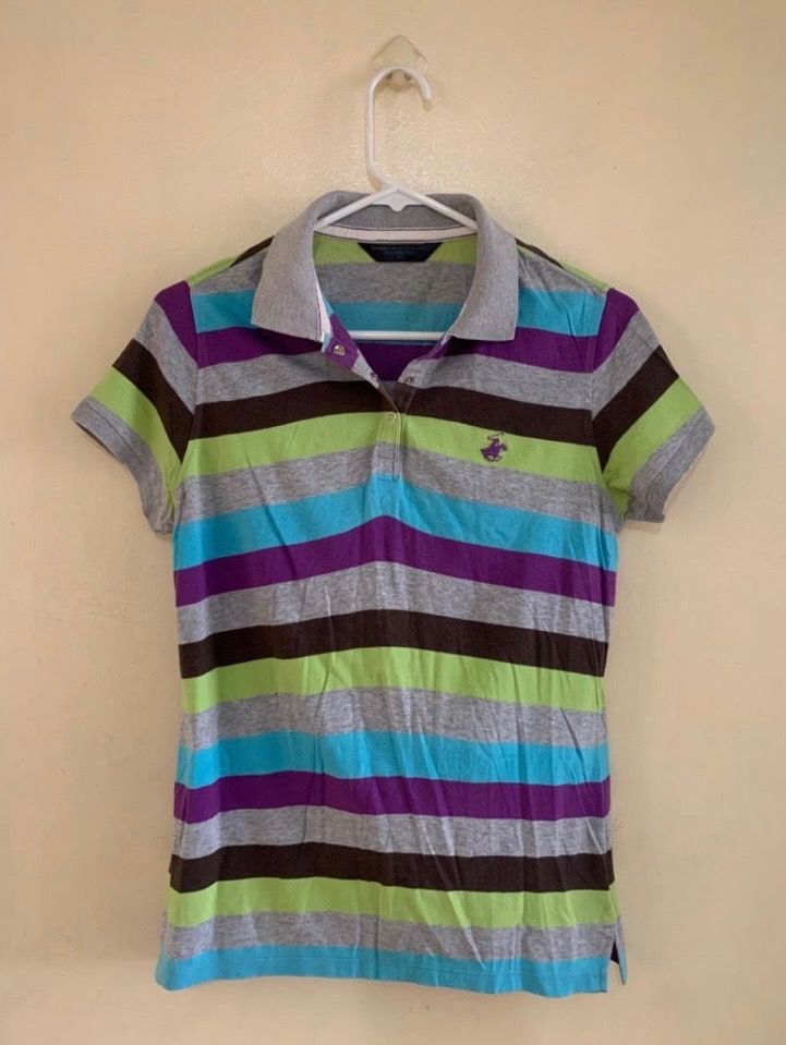Beverly Hills Poloshirt Womens (Category: Blouses) located in Valenzuela. Submitted by clickandshoppreloved (Listing ID 1466623316, Image 1). Description: Beverly Hills Poloshirt Womens Onhand, Original Small Ontag, (24L x 16W) Color : Striped (Good Condition).