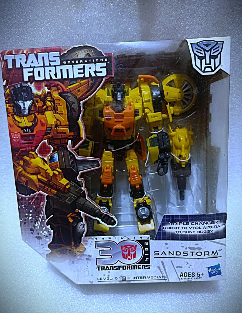 BIB Thrilling SANDSTORM Voyager Class Hasbro Decepticon Transformers (Category: Kids Toys) located in Pasay City. Submitted by Chariselyn (Listing ID 1466586429, Image 1). Description: BIB Thrilling SANDSTORM (4,000+sf) Voyager Class Hasbro Decepticon Transformers Series: Generations - Thrilling 30th Anniversary, 2014 Scale: 7 inches Stock: 1 Box Condition: 9/10 Issues: 0 Accessories: complete, no manual Mode of Payment: GCash or through your rid