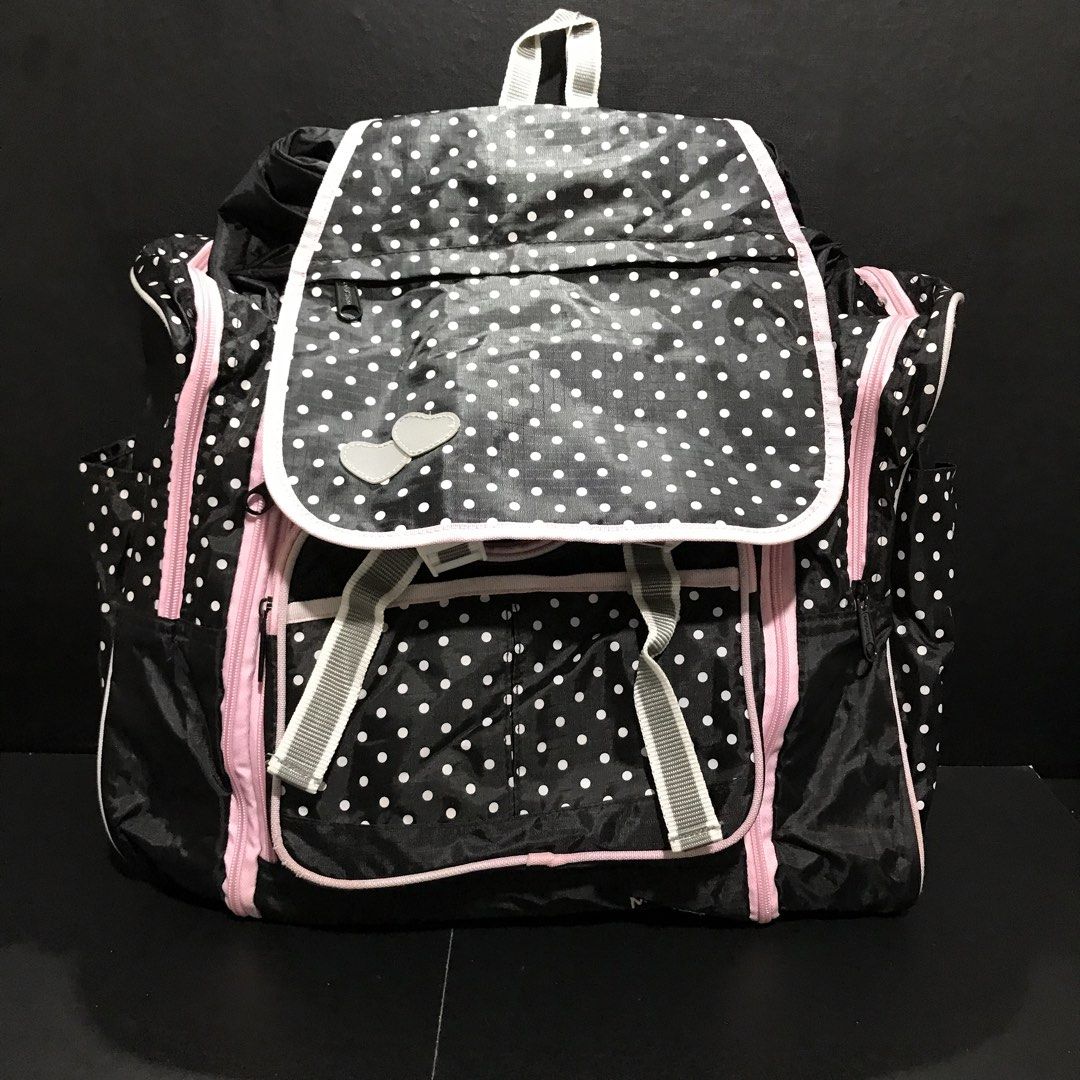 Black and White Polka Dot Backpack with Pink Trim (Category: Backpacks) located in Baao. Submitted by all.things.japan (Listing ID 1466708205, Image 2). Description: 17.0 x 8.0 x 13.0 inches - Stylish black and white polka dot design with cute pink zippers and piping - Secure flap closure featuring a lovely double heart embellishment - Multiple front and side exterior pockets for easy organization - Roomy main compartment to fit all your daily es
