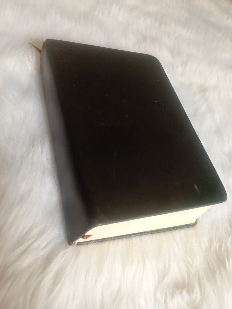 Black Hardcover Notebook Blank Pages Ribbon Bookmark (Category: Stationery & School Supplies) located in Tuguegarao City. Submitted by four-zero-four (Listing ID 1466588687, Image 1). Description: Color: Solid black hardcover Pages: Plain, cream-colored blank pages Features: Built-in ribbon bookmark and sturdy binding Style: Classic minimalist design Best for: Daily journaling, sketching, and note-taking (has minor flaws in-front of the cover).