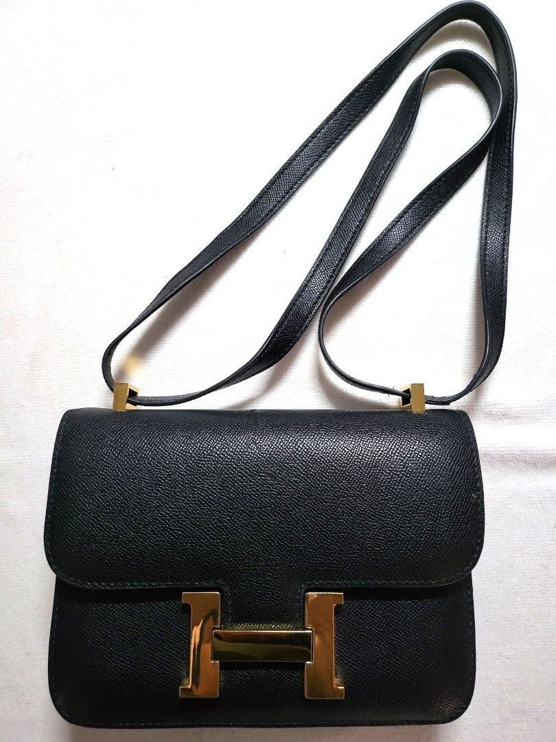 Black H-Buckle Structured Flap Shoulder Bag / (Category: Cross-body Bags) located in Imus. Submitted by cheratedfinds (Listing ID 1466611223, Image 1). Description: [CONDITION] - Pre-loved condition - Hardware has light surface scratches/tarnish - Minor wear/crack on side edge glazing (see detailed photos) - Overall clean interior and functional structure.