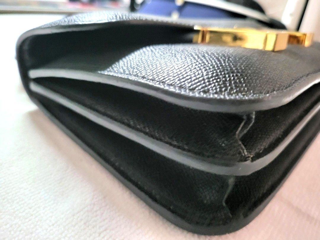 Black H-Buckle Structured Flap Shoulder Bag / (Category: Cross-body Bags) located in Imus. Submitted by cheratedfinds (Listing ID 1466611223, Image 2). Description: [CONDITION] - Pre-loved condition - Hardware has light surface scratches/tarnish - Minor wear/crack on side edge glazing (see detailed photos) - Overall clean interior and functional structure.