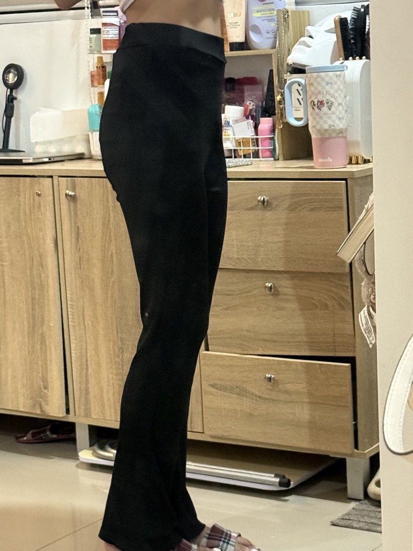 Black high waisted flare pants bootcut trousers (Category: Jeans) located in Manila. Submitted by mightystone-d948cd (Listing ID 1466771837, Image 2). Description: - Color: Solid black - Fit: High-waisted, hugs the hips and thighs, flared at the bottom - Material: Super stretchy and comfortable for everyday wear - Styling: Clean look, easy to match with crop tops or basic tees.