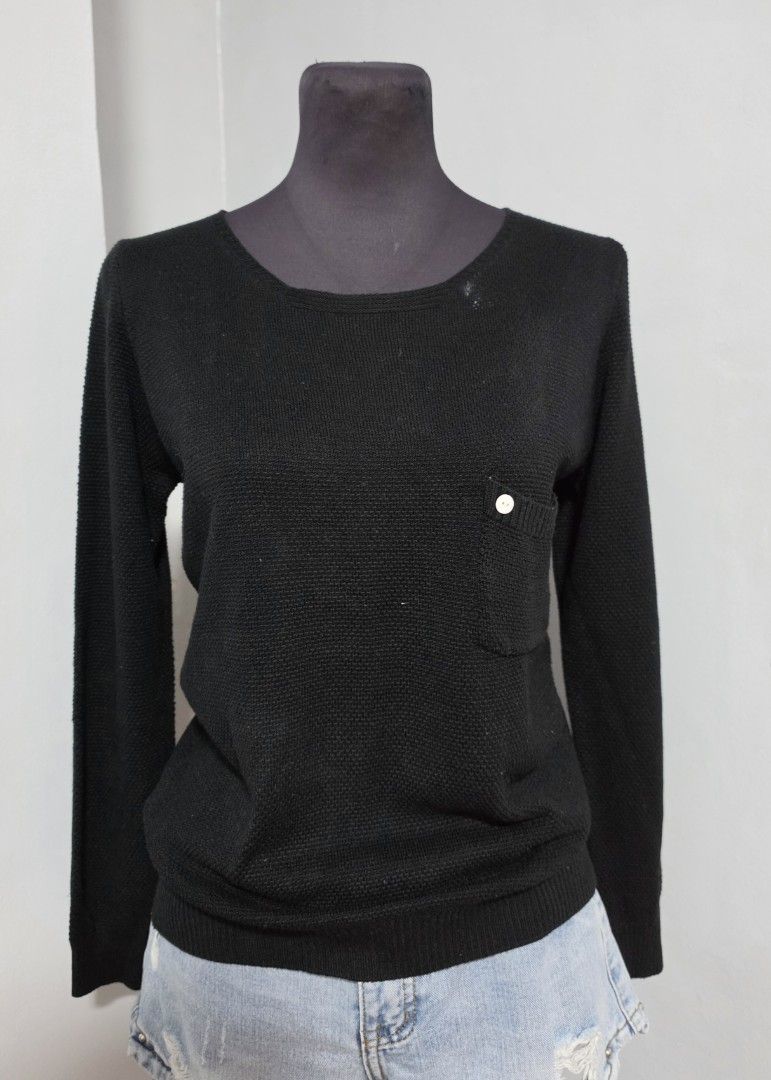 Black Knit Long Sleeve Sweater with Pocket (Category: Longsleeves) located in Paranaque City. Submitted by franinnashop (Listing ID 1466615401, Image 1). Description: DECLUTTER SMALL TO MED ISSUE LAST PHOTO MAY WHITE NOT SURE IF WASHABLE PARANAQUE CITY - Color: Black - Style: Long sleeve knit sweater with classic crew neckline - Details: Textured knit fabric and a chic left chest pocket with two decorative white buttons - Finish: Ribbed trim on c