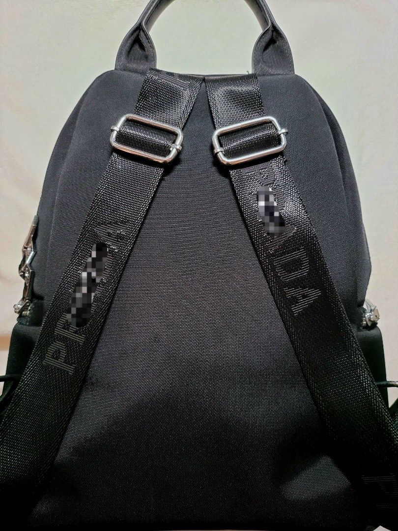 Black Multi-Compartment Backpack (Category: Backpacks) located in Imus. Submitted by cheratedfinds (Listing ID 1466617031, Image 2). Description: Sleek, practical, and stylish black nylon backpack designed for daily work, school, or travel use. Easily fits an iPad/tablet and up to a 13" laptop! [FEATURES] - Lightweight & durable water-resistant nylon material - Spacious main compartment with zipper closure - Fits tablets/iPads and 13" laptops com
