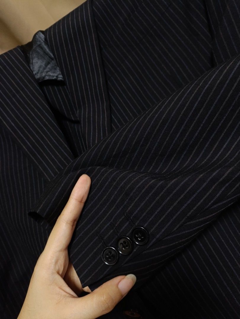 Black Pinstriped BF Blazer (Category: Coats, Jackets and Outerwear) located in Taguig. Submitted by vm.co (Listing ID 1461304580, Image 2). Description: Perfect for: • Corporate office wear • Business travel • Smart casual outfits • Rainy or cool weather • Capsule wardrobe • Everyday sophisticated styling Condition: Appears to be in very good preloved condition with no visible major stains, tears, or discoloration in the photo. A light steam will