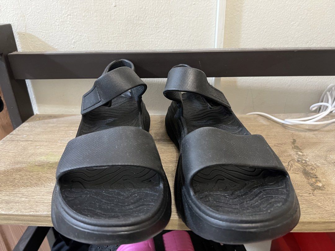 Black Platform Sandals (Category: Flats & Sandals) located in Manila. Submitted by 2s2knpt9nw34311 (Listing ID 1466657966, Image 1). Description: - Color: Black - Style: Minimalist open-toe platform sandals - Features: Chunky soles, adjustable velcro straps, and wavy textured footbed for grip - Material: Lightweight foam construction for easy slip-on wear - Ideal for: Casual walking and daily use.