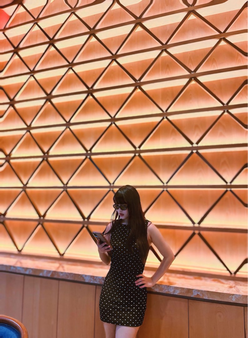 Black polka dot mini dress sleeveless (Category: Dresses) located in Taguig. Submitted by chicquisite (Listing ID 1466747043, Image 2). Description: - Color/Pattern: Black with tiny white polka dots - Cut: Sleeveless with a high neckline - Fit: Form-fitting, hits above the knee - Material: Lightweight and comfortable fabric - Versatility: Perfect for casual outings or evening events - Styling: Easy to pair with boots, heels, or simple accessories