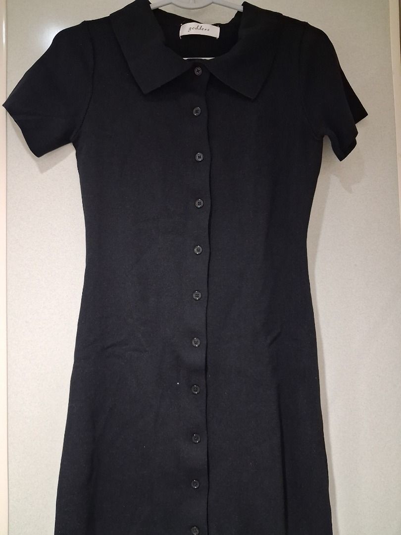 Black ribbed midi dress with collar and button front (Category: Dresses) located in Pasay City. Submitted by by_cln (Listing ID 1466594750, Image 1). Description: - Color: Black - Style: Fitted midi dress with short sleeves - Material: Ribbed knit with lots of stretch for all-day comfort - Details: Classic collar and full-length button placket with matching dark buttons - Versatility: Great basic piece for work, casual outings, or everyday wear -