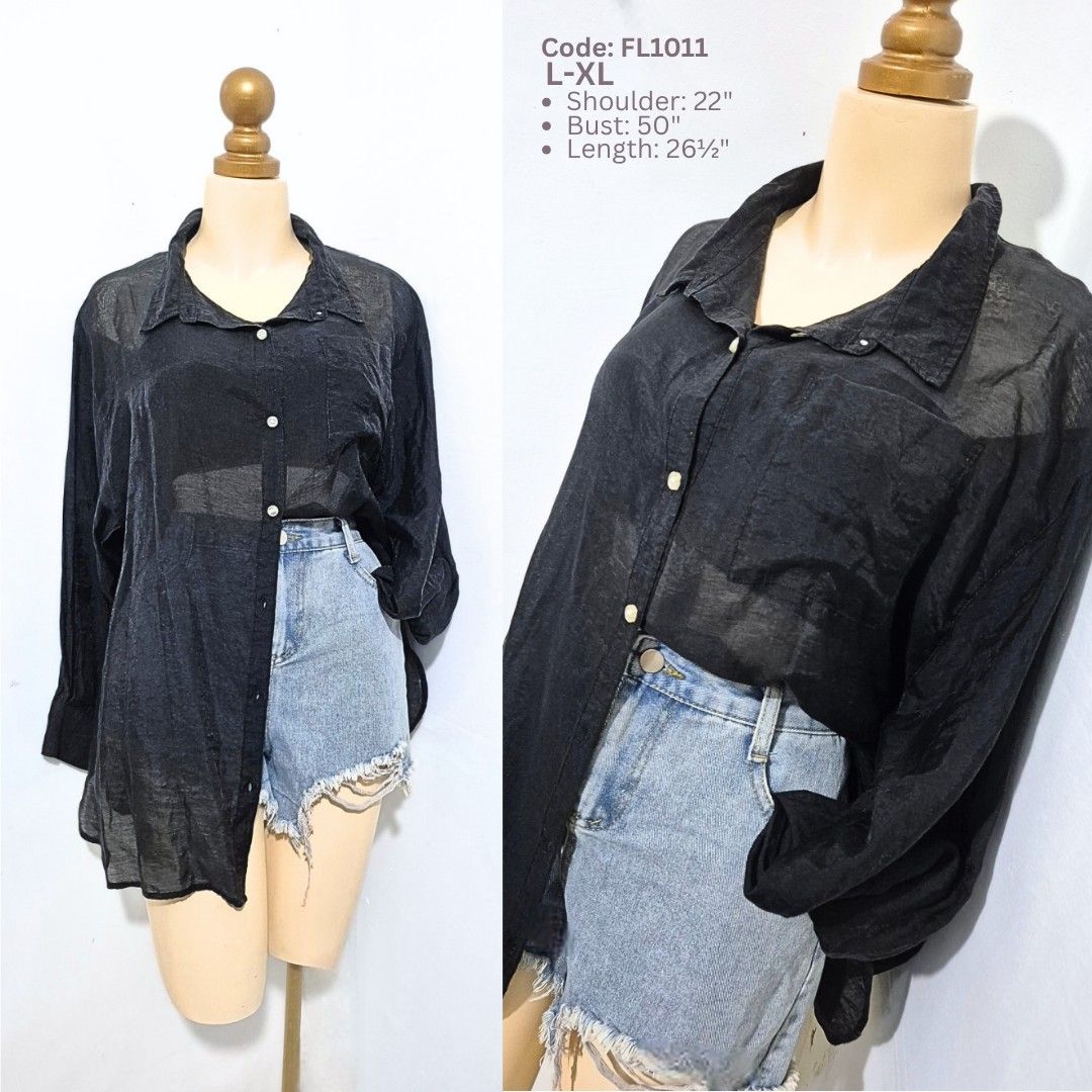 Black Sheer Oversized Button-Down Shirt | L–XL (Category: Longsleeves) located in Cabanatuan. Submitted by _erboutique (Listing ID 1466676746, Image 1). Description: • Classic black sheer shirt — effortless & versatile 🖤 • Collared, button front, loose oversized fit • Lightweight & flowy — great layered or open as a cover-up • Size L–XL | Shoulder 22" | Bust 50" | Length 26½" • Great condition, easy everyday staple.