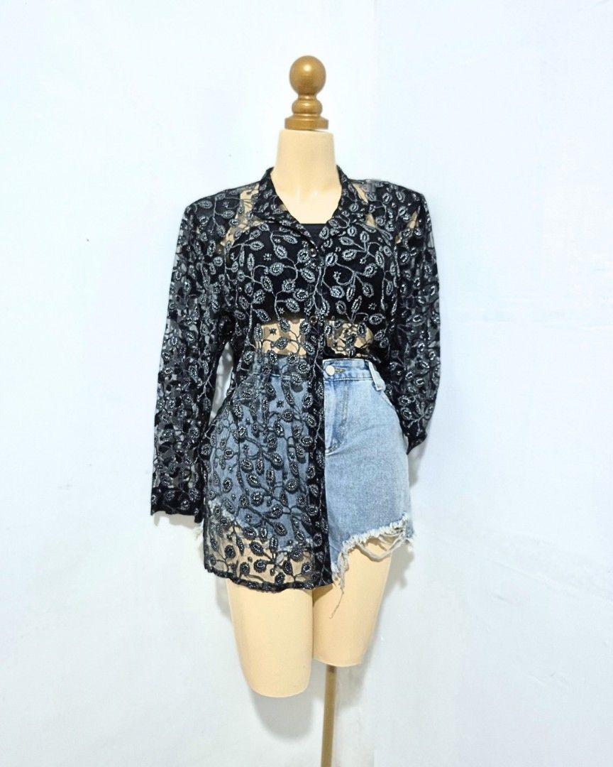 Black Silver Floral Lace Button-Down Top | L–XL (Category: Longsleeves) located in Cabanatuan. Submitted by _erboutique (Listing ID 1466677461, Image 3). Description: • Stunning black lace with silver floral embroidery — so chic & unique ✨ • Collared, button front, sheer statement piece • Pair it with a camisole or bralette underneath • Size L–XL | Shoulder 19" | Bust 44" | Length 28" • Great condition, perfect for dressing up.