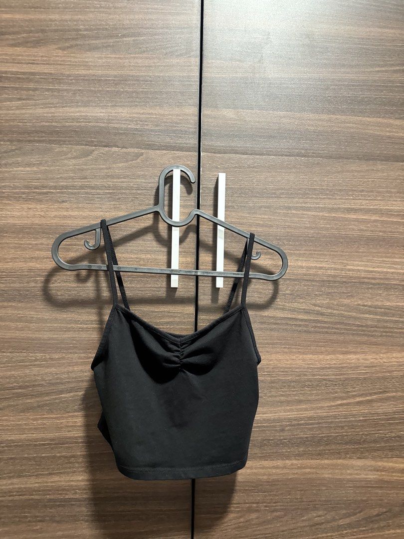 Black Spaghetti Strap Crop Top with Ruched Front Detail (Category: Sleeveless) located in Manila. Submitted by katrinakatee (Listing ID 1466671757, Image 1). Description: - Color: Black - Style: Crop top with thin straps and cute ruched center neckline - Material: Stretchy, comfortable fabric - Condition: Worn a few times, solid shape, no stains or loose threads - Pairing: Perfect to match with high-waisted jeans or skirts.
